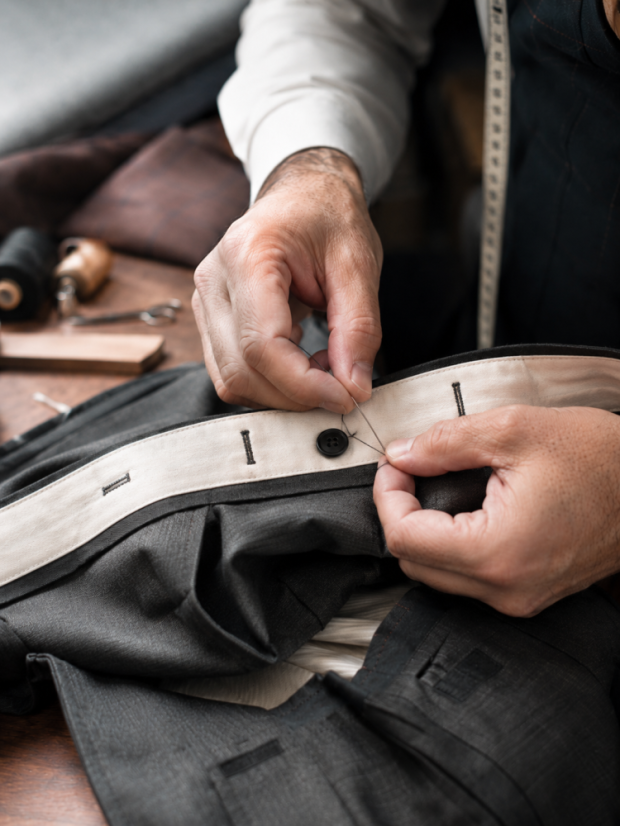 Sewing brace buttons onto trousers
