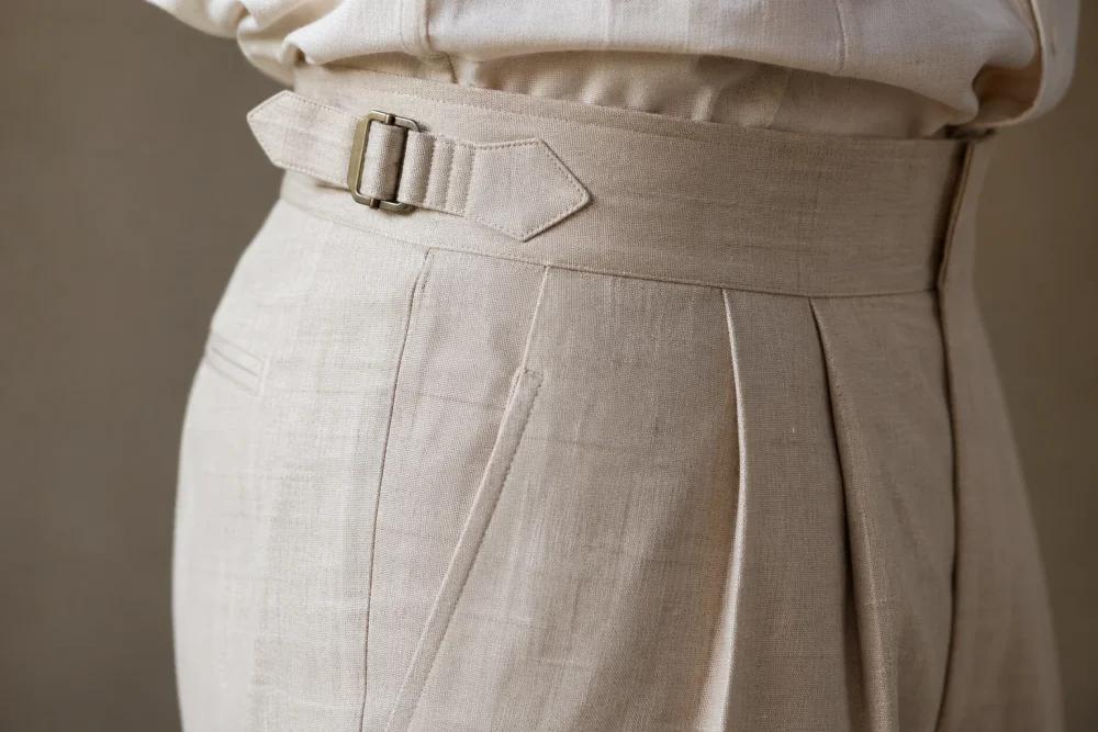 Detail of the high waist and fastening on Gurkha trousers